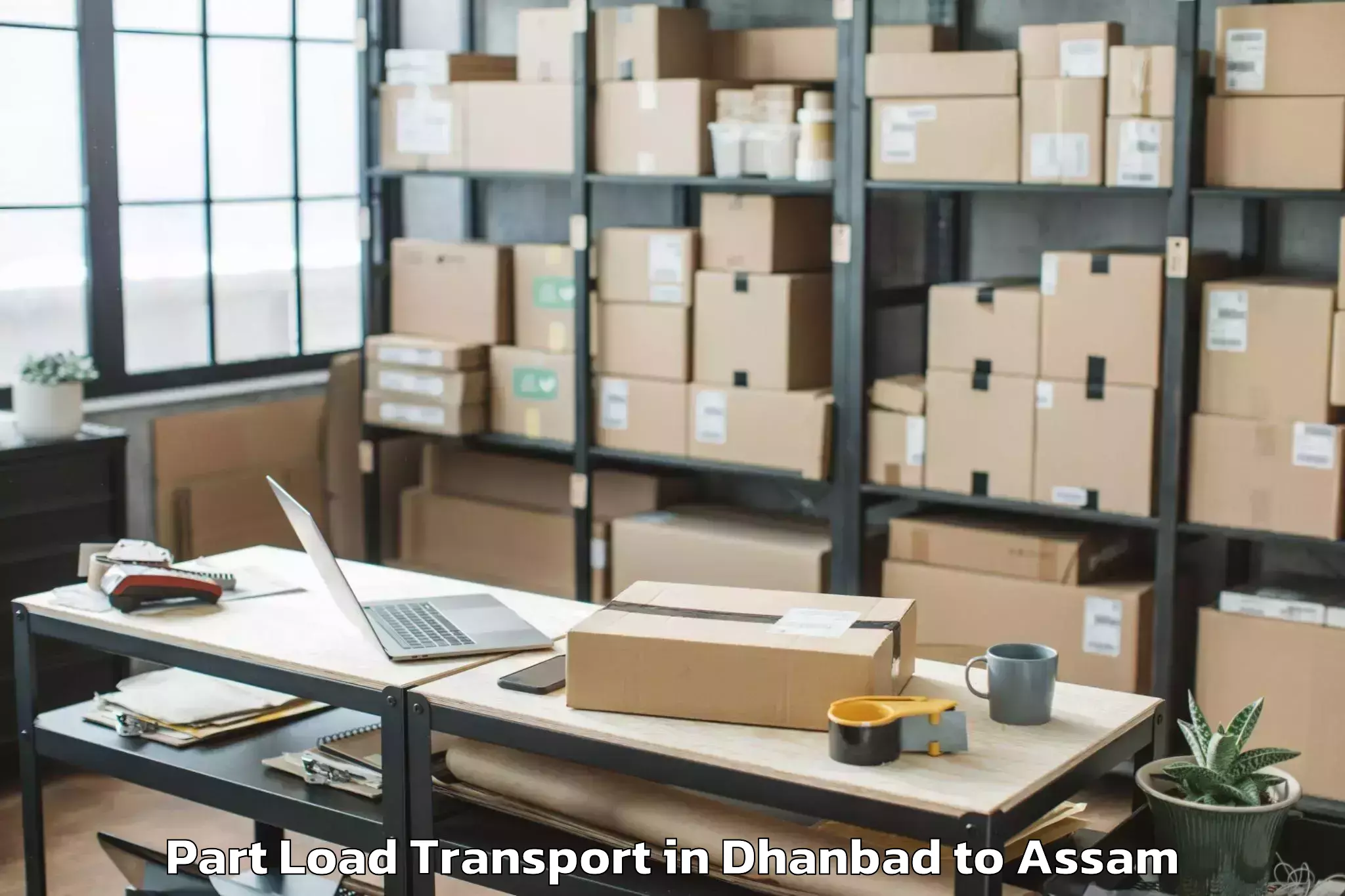 Top Dhanbad to Chaparmukh Part Load Transport Available